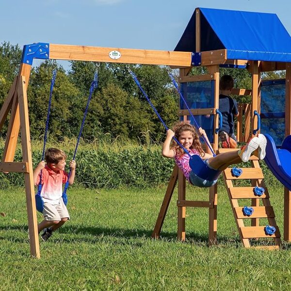 Backyard Discovery Spielturm Aurora aus Holz | XXL Spielhaus für Kinder mit Rutsche, Schaukeln und Kletterleiter | Stelzenhaus für den Garten - Image 4